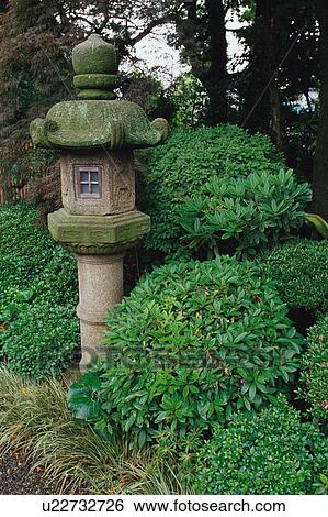 Stock Photograph - Stone lantern in a garden. Fotosearch
