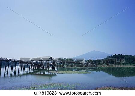 Stock Image - Tsurunomai Bridge in Aomori Prefecture, Japan. Fotosearch
