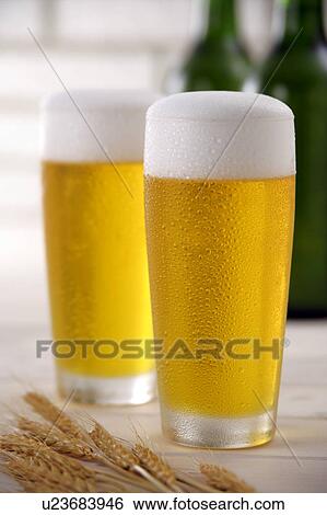 Two glasses of beer View Large Photo Image Stock Photograph - Two glasses of beer. Fotosearch