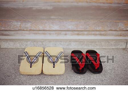 Stock Photo - Two pairs of Geta sandals. Fotosearch