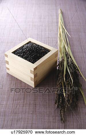 Uncooked black rice in a cup View Large Photo Image Stock Image - Uncooked black rice in a cup. Fotosearch