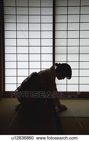 Woman bowing View Large Photo Image Stock Image - Woman bowing. Fotosearch