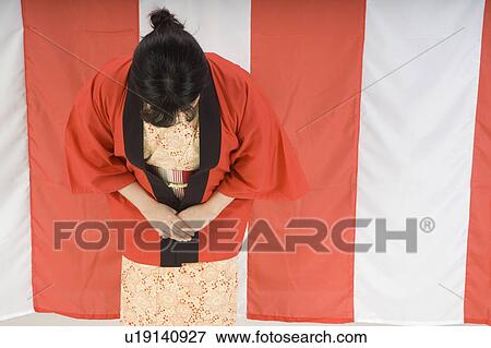 Stock Photo - Woman bowing. Fotosearch
