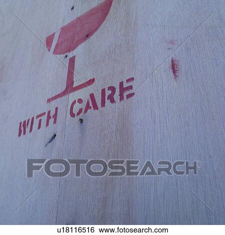 Stock Photograph - Wooden crate with "handle with care" mark. Fotosearch