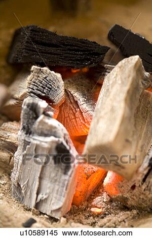 Stock Photography - Burning charcoal, close up, differential focus, Japan. Fotosearch