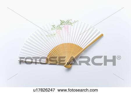 Stock Photo - Japanese folding fan, high angle view, white background. Fotosearch