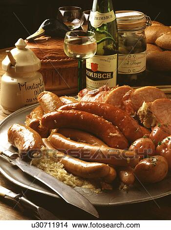 Picture - A variety of meats and potatoes. Fotosearch