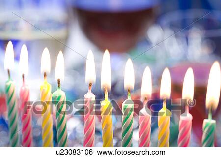 Birthday Candles burning View Large Photo Image Stock Photograph - Birthday Candles burning. Fotosearch