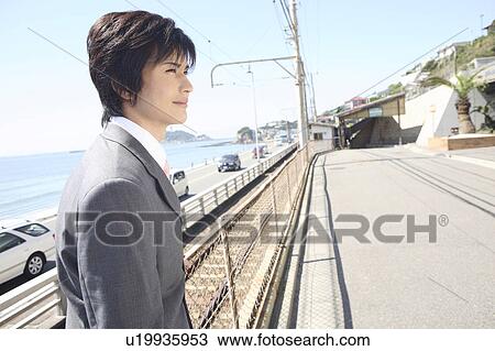 Stock Image - businessman on street. Fotosearch