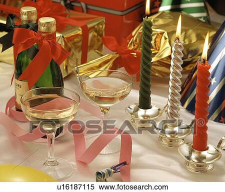 Champagne, candles, and gifts View Large Photo Image Stock Photography - Champagne, candles, and gifts. Fotosearch