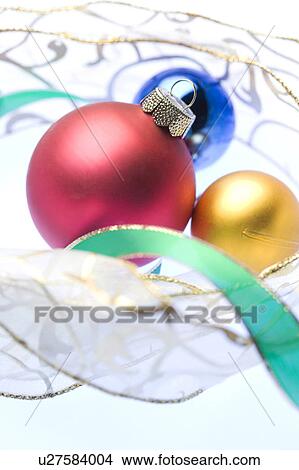 Christmas decorations and ribbon View Large Photo Image Picture - Christmas decorations and ribbon. Fotosearch