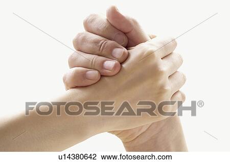 Stock Image - Clasped Hands. Fotosearch
