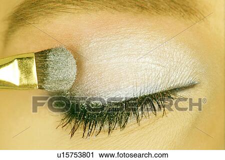 Close-up of eye shadow being applied View Large Photo Image Stock Image - Close-up of eye shadow being applied. Fotosearch