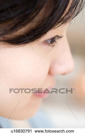 Stock Image - Close-up of woman's face. Fotosearch