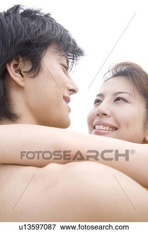 Couple hugging View Large Photo Image Stock Photo - Couple hugging. Fotosearch