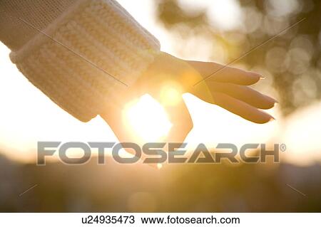 Finger encircling sun View Large Photo Image Stock Image - Finger encircling sun. Fotosearch