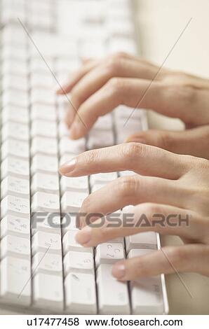 Fingers typing on Keyboard View Large Photo Image Stock Photo - Fingers typing on Keyboard. Fotosearch