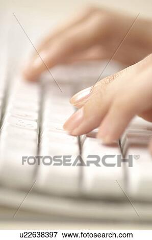 Stock Photo - Fingers typing. Fotosearch