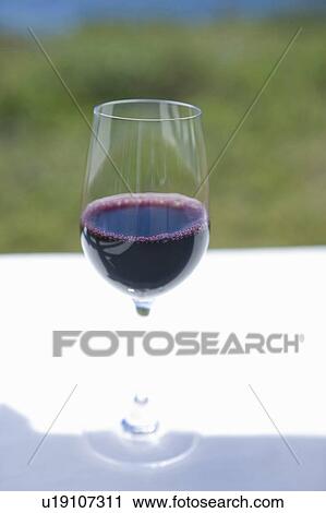 Stock Image - Glass of Red Wine. Fotosearch