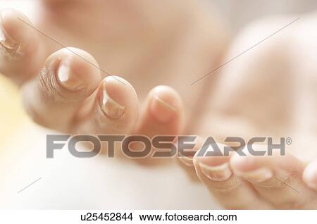 Picture - Hands held out close up. Fotosearch