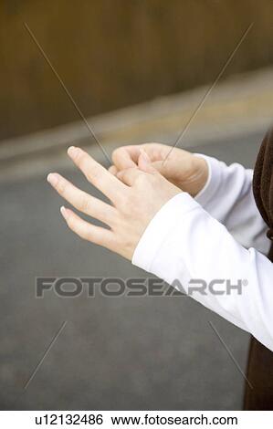 Hands of a young woman View Large Photo Image Stock Photograph - Hands of a young woman. Fotosearch