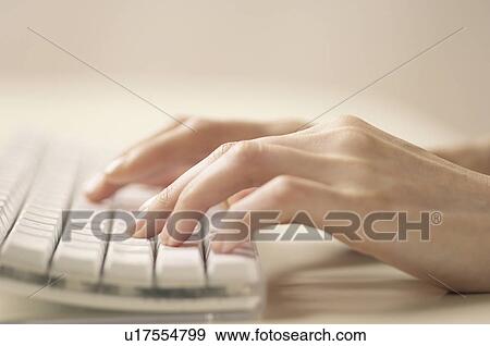 Stock Photo - Hands typing. Fotosearch