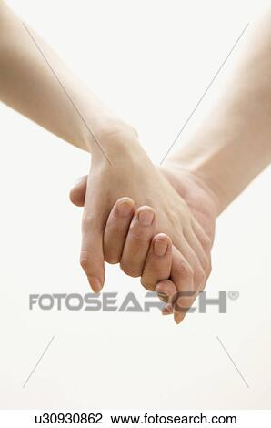 Stock Image - Holding Hands. Fotosearch