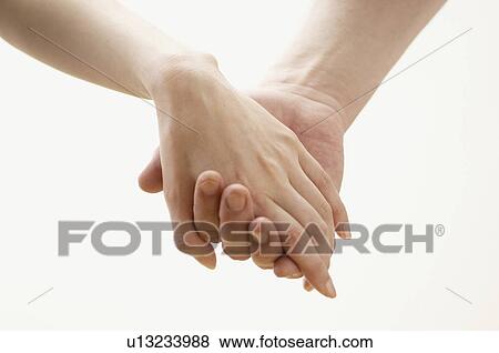 Holding hands View Large Photo Image Stock Photo - Holding hands. Fotosearch