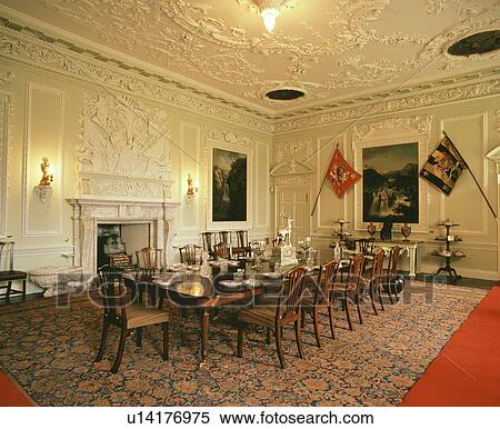 Stock Photography - Large dining room with ornate decor. Fotosearch