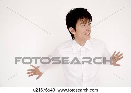 Man leaning against a wall View Large Photo Image Stock Image - Man leaning against a wall. Fotosearch