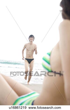 Stock Photo - Man running up to lover. Fotosearch