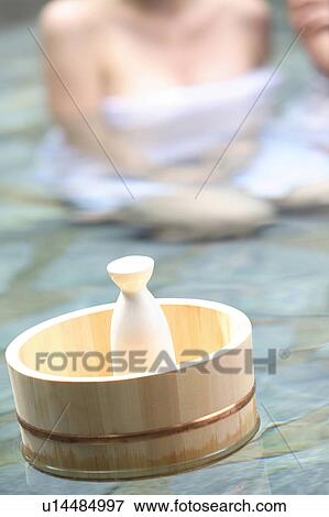 Pail and sake bottle View Large Photo Image Stock Photo - Pail and sake bottle. Fotosearch