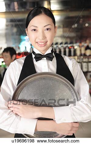 Portrait of a waitress View Large Photo Image Stock Photo - Portrait of a waitress. Fotosearch