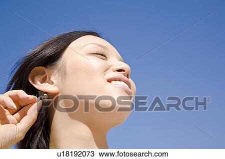 Stock Image - Portrait of woman. Fotosearch