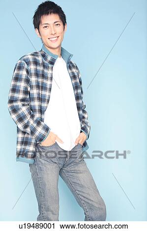 Stock Image - Portrait of young man. Fotosearch