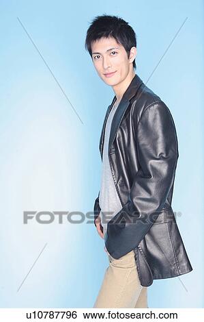 Stock Photograph - Portrait of young man. Fotosearch