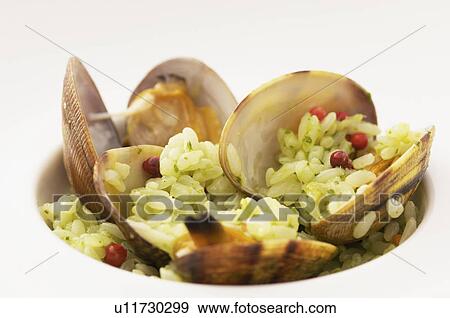 Stock Photo - Risotto with oysters. Fotosearch