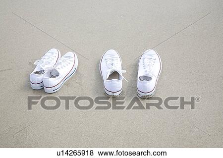 Shoes left on a beach View Large Photo Image Stock Photo - Shoes left on a beach. Fotosearch