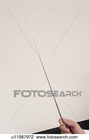 Stock Image - Side view of a pointer and a screen. Fotosearch