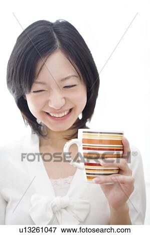 Stock Photo - Smiling woman. Fotosearch