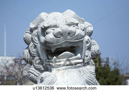 Stock Photograph - Stone guardian dog. Fotosearch