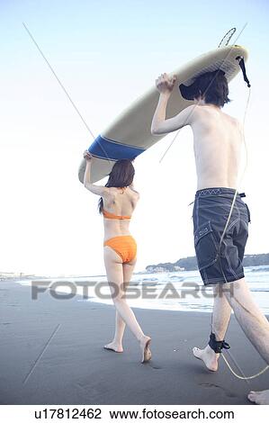 Surfers at Enoshima beach View Large Photo Image Stock Image - Surfers at Enoshima beach. Fotosearch
