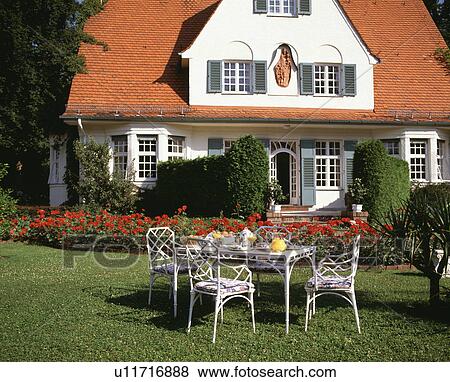 Stock Photo - Table in an outdoor garden. Fotosearch