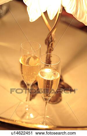 Stock Image - Two glasses of champagne. Fotosearch