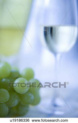 Stock Photograph - White wine and grapes. Fotosearch