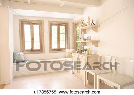 Stock Photography - Window seat and chairs. Fotosearch