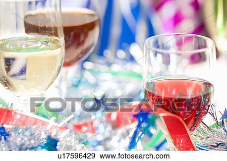 Stock Photo - Wine glasses at a party. Fotosearch