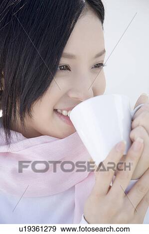 Woman drinking coffee View Large Photo Image Stock Photo - Woman drinking coffee. Fotosearch