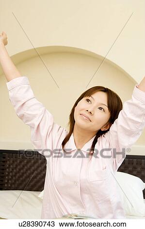 Woman waking up View Large Photo Image Stock Image - Woman waking up. Fotosearch