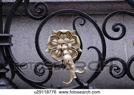 Wrought iron with gold floral decoration View Large Photo Image Stock Photograph - Wrought iron with gold floral decoration. Fotosearch
